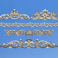 Intricate Decorative Carvings With Floral Scroll Patterns Against Blue Background
