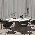 Round Marble Top Dining Table Set With Gray Chairs Wooden Legs And Plant Decor