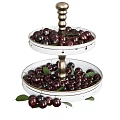 Fresh Ripe Cherries on Two Tier White Tray with Golden Stand and Green Leaves