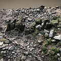 Rugged Rocky Terrain With Scattered Pebbles Green Vegetation Wooden Stakes And Chain