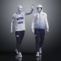 Two Mannequins Displaying Athletic Sportswear With White Tops Dark Pants And Brand Logos
