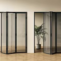Partially Open Black Frame Folding Doors With Glass Mesh Panels And Potted Plant