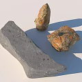 Natural Stones With Varied Shapes Textures And Colors On Light Surface