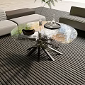 Modern Round Glass Coffee Table With Textured Top And Black Metal Legs In Living Room