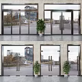 Modern Glass Entrance Doors With Metal Frames And Urban View