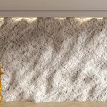 Gray Textured Background Wall Featuring Golden Deer Decor LED Strip Lights And Wooden Floor
