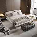 Modern Double Bed with Soft Pillows and Cozy Blanket in Bedroom With Leather Chair Ottoman
