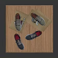 Grey Casual Sneakers Displayed On Stacked Cardboard Boxes For Home Use