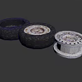 Automotive Car Parts with Worn Black Tires and Silver Wheel Rims