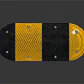 Black And Yellow Speed Bump With Chevron Pattern And Mounting Holes