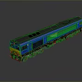 Blue InterCity Model Train Diesel Locomotive With Yellow Front On Reflective Surface