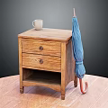 Wooden Nightstand With Two Drawers Open Shelf Blue Umbrella And White Mug On Wooden Floor