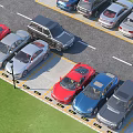 Various Colored Cars Parked In Organized Parking Lot With Green Lawn And Road Lines