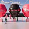 Giant Red And Black Balloons With Barbie Black And Summer Designs Surrounded By Cactus Decorations
