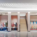 Modern Clothing Store Interior With Fashion Apparel Display Shelves And Bright Lighting