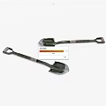 Two Green Entrenching Shovels With Metal Handles And Durable Shovel Heads For Outdoor Engineering Work