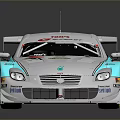 Silver and Light Blue Racing Car with Aerodynamic Design Rear Wing and Sponsor Logos