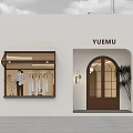 YUEMU Clothing Store White Building Exterior With Arched Doorway And Display Window