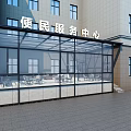 Glass Canopy Structure At Community Service Center With Outdoor Seating Tables And Chairs