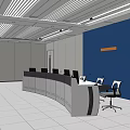 Monitoring Room Interior With Curved Console Multiple Computers And Blue Wall
