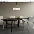 Modern Oval Dining Table Set with Black Tabletop White Chairs Pendant Light and Fruit Bowl