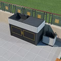 Outdoor Sink Countertop Station With Cabinet Doors And Gold Accent Railing By Grass Lawn