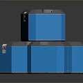 Three Blue Storage Boxes With Gray Lids And Red Labels On Reflective Surface
