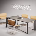 Modern Table and Chairs Set with Beige Seats Metal Frames and Stylish Pendant Light Above