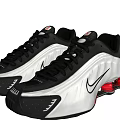 Stylish Black And White Sneakers With Red Accents And Nike Logo