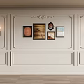 Elegant White Wall Paneling Interior With Framed Artwork And Wall Sconces