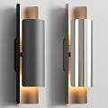 Modern Gray and Silver Wall Lamps with Sleek Design and Warm Light Glow on Wall