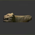 Traditional Stone Beast Head Sculpture With Intricate Carved Details And Texture