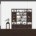 Traditional Chinese Wooden Display Cabinet With Decorative Items Tea Sets Books And Potted Plant