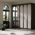 Black Wardrobe With Glass Doors And Rattan Panels In Elegant Interior With Arched Windows