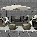 Outdoor Wicker Sofa Set Featuring White Parasol Coffee Table Round Stools And Green Plants