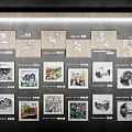 Gallery Wall Display With Various Artworks Including Colorful And Black White Paintings