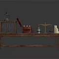 Woman Arranging Antiques On Wooden Table With Birdcage Chess Chest And Scrolls