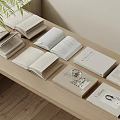 Minimalist Style Open And Closed Books With BAITON Title And Green Plant On Wooden Table