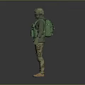Man In Tactical Gear With Green Vest Camouflage Pants Helmet And Gloves Standing