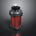 Red and Black Cylindrical Weapon with Silver Top Component and Modern Tactical Design
