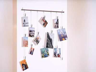 Creative Photo Wall Hanging On White Wall With Clothespins And Multiple 3d model