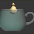 Cute Yellow Duck Toy in Gray Mug with Green Lily Pads on Water
