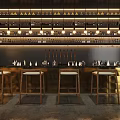 Row of Wooden Bar Stools With White Cushions At Modern Bar Counter