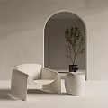 Stylish Beige Leisure Chair With Stone Side Table Near Arched Doorway Accompanied By Green Plant