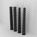 Four Black Spiral Candle Lamps With White Wicks On Grey Background