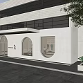 Modern Storefront with White Exterior Arched Design Wooden Door Circular Windows Trees and Stone Pavement
