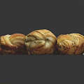 Fresh Twisted Steamed Buns Arranged in a Pile with Golden Brown Crust and Soft Inside
