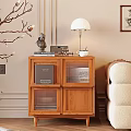 Wooden Bedside Table With Lamp Statue Radio Books And Teacup In Cozy Interior