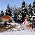 Snowy Winter Camping Site With Orange Tent Bonfire Snowman Pine Trees And Red Truck