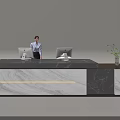 Modern Reception Desk Area With Marble Counter Two Computers Female Receptionist And Small Plant